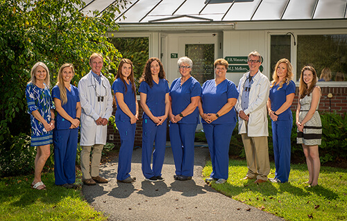 The Lyme Road Dental team in Hanover, NH standing outside of our office
